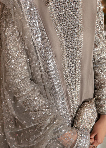 Luxury Grey Raw Silk Formal Suit with Heavy Silver Hand Embellishment, Organza Sleeves, Swarovski Detailing, Net Dupatta with Sequin Border, and Pure Raw Silk Chooridar Pants for Elegant Evening and Festive Wear