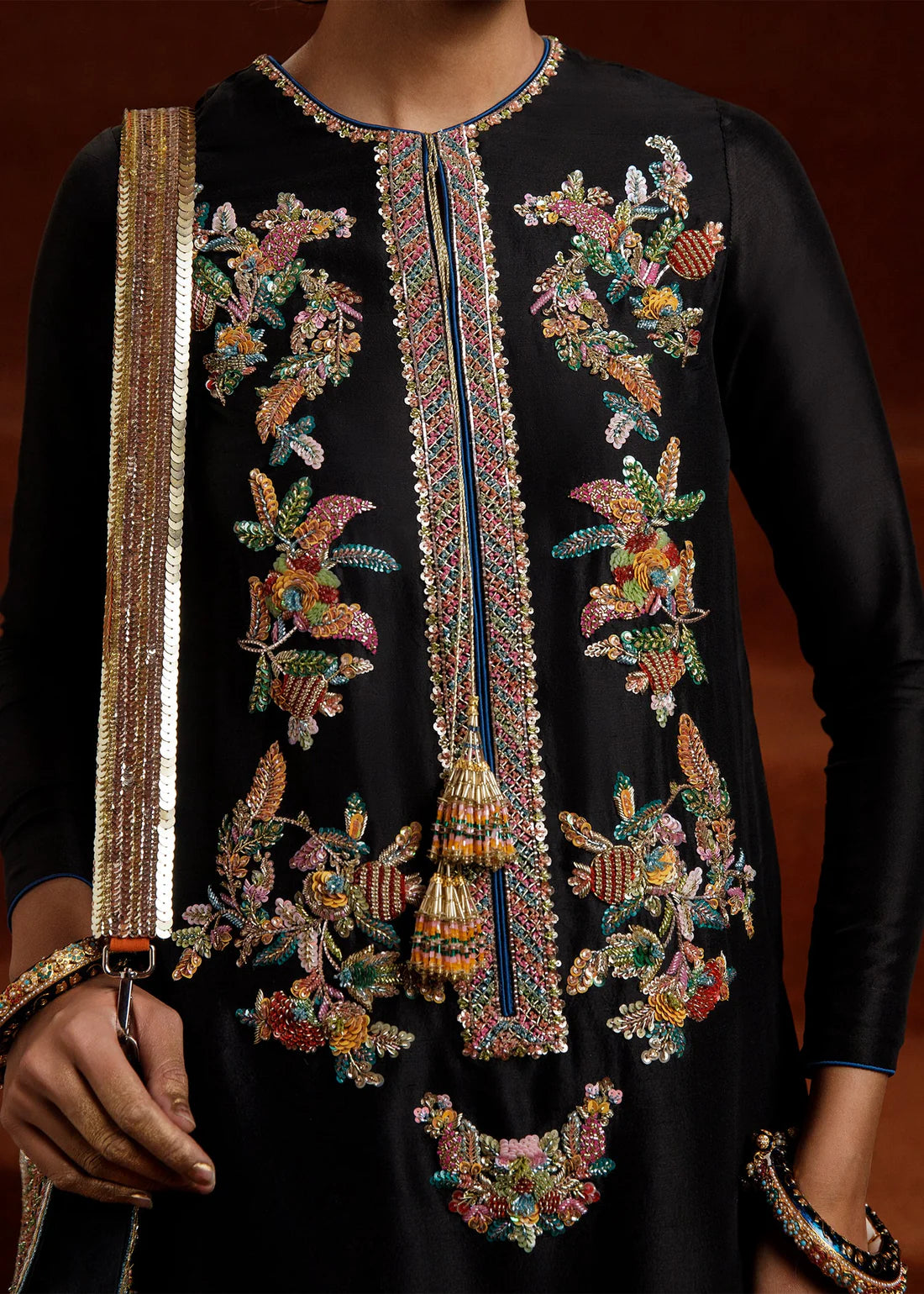 Luxury Black Raw Silk Embellished Shirt with Handcrafted Multicolor Beadwork, Elegant Palazzo Pants and Glitzy Organza Dupatta with Signature Potli for Formal and Festive Wear