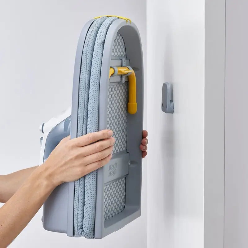 Folding desktop ironing board, wall-mounted steel mesh with iron stand, space saving, convenient laundry hooks